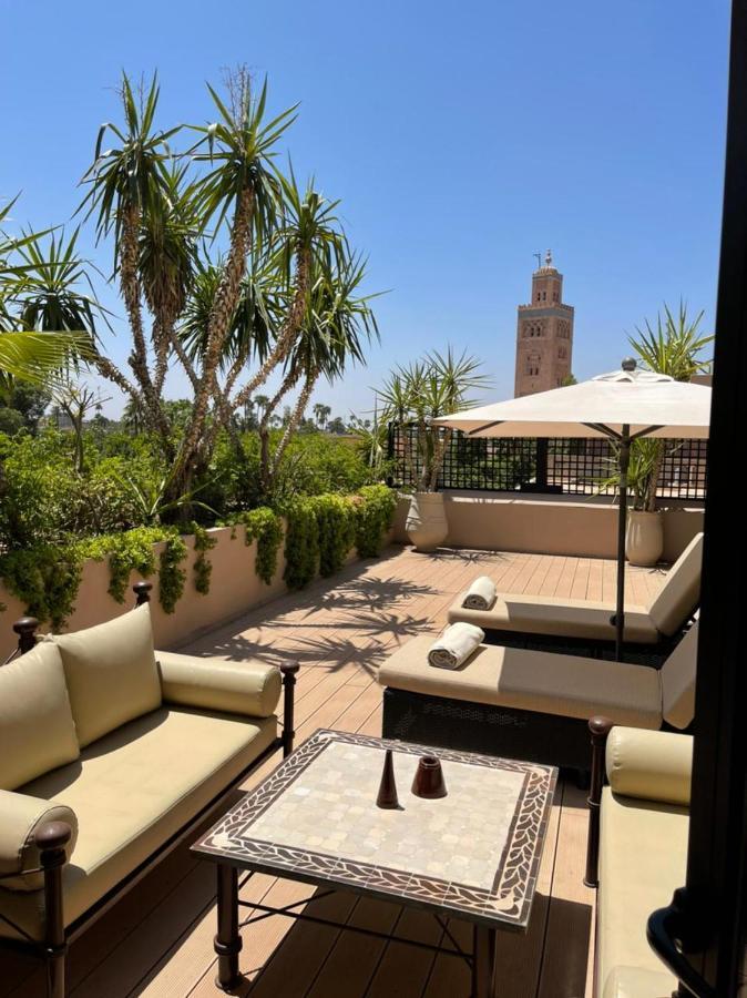 Les Jardins De La Koutoubia Hotel Marrakesh Exterior photo Rooftop terrace at the Four Seasons Hotel in Marrakech, Morocco